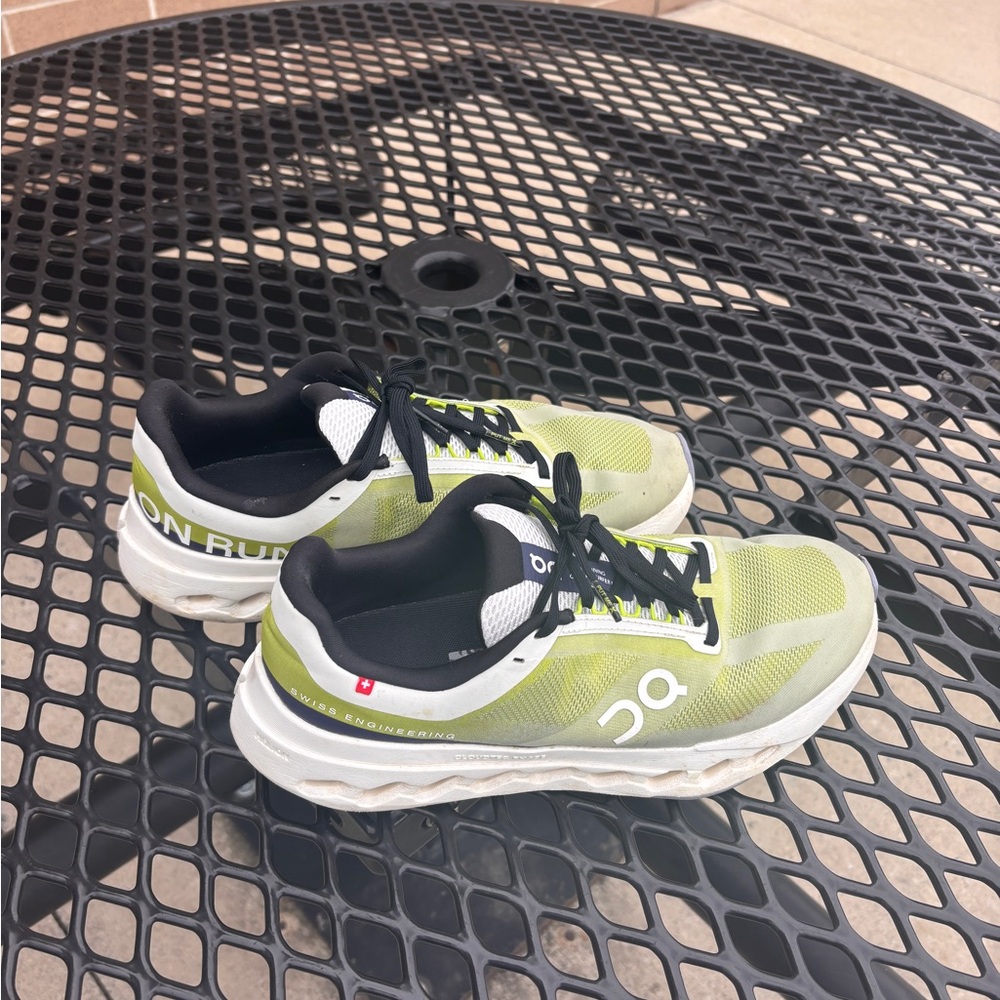 On Running Lime and Black Sneakers